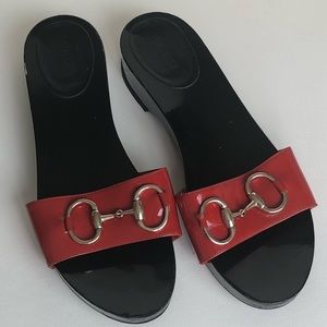 Gucci slides.